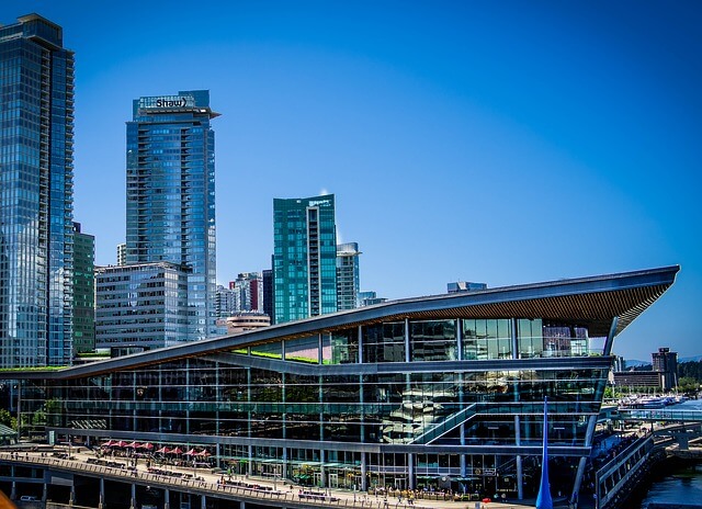 This photo shows Canada Place and some of the downtown buildings of Vancouver. You can see the coloured reflections in the glass showing the energy coatings.